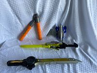 Four role-play toys laid out on cloth background