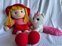 Front view of rag doll and unicorn together
