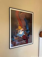 Full view of framed Alice in Wonderland poster on wall