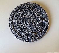 Front view showing full Aztec-Mayan calendar design