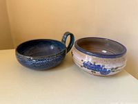 Top view of both stoneware bowls showing interior glazes and shapes