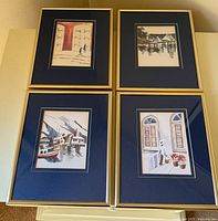 All four framed watercolor prints grouped