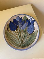 Front view of floral pottery plate