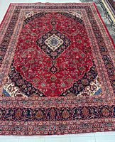 Full view of rug showing overall design and borders