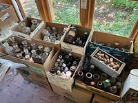 six boxes filled with antique bottles and tray of corks