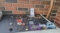 Overview of all jewellery pieces on table