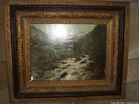 Full view of framed landscape picture showing image and entire frame