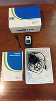 All components: Nokia phone, user guide, charger, box and tray