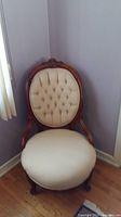 Full view of carved wood Queen Anne chair