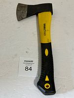 Full hatchet view showing head, handle and lanyard hole