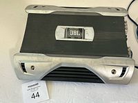 Top view of JBL GTO3501 amplifier showing logo and chassis