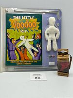 Front of sealed Little Voodoo Kit blister pack, Little Voodoo Doll box visible