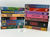 Front view of both VHS stacks showing titles and cases