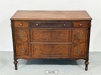 Front view of dresser showing overall design and drawers