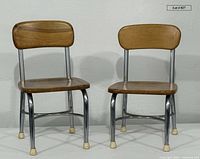 front view of both Heywood Wakefield children’s chairs