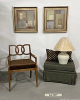 Group shot showing chair, ottoman, lamp, pillow, two artworks