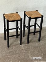 Front angle view of both stools showing design and finish