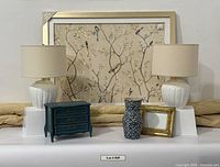 All items group shot: comforter, framed art, two lamps, vase, jewelry chest, gold frame