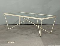 Full view of coffee table showing frame and glass top