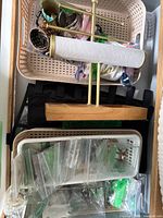 Top basket with bracelets, cuffs, pouches, jewelry bags