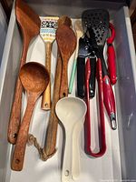 Drawer of assorted kitchen utensils
