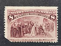 Front view of 8¢ Columbian stamp showing vignette, denomination and text