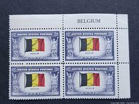 Front view of the four-stamp plate block showing flag design and denomination