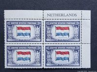 Front view of four-stamp plate block showing design and selvage