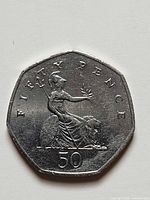 Reverse showing Britannia with lion and 50 denomination
