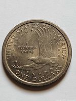 Reverse side showing eagle and denomination