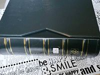 closed black binder showing spine design and size