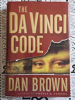 Front cover displaying title, author, and partial Mona Lisa image