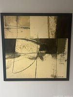 Front view of framed abstract painting showing full artwork and signature