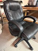 Front angled view showing seat, backrest, armrests and base