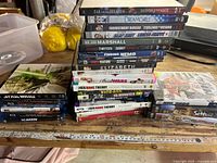 Overall view of stacked DVDs, Blu-rays and games