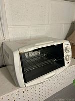 Front view of Proctor Silex toaster oven closed