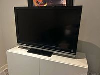 Front view of Sony flat-panel TV on stand