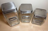 Angled top view of canisters with lids on
