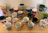 All mugs arranged, front and back rows visible