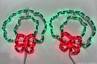 Both wreath decorations illuminated to show function and color
