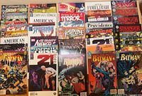 Overall view of 40 assorted comic books laid out in rows