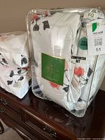 Comforter in original zippered case with label visible