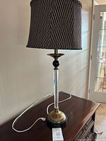 Full view of table lamp with shade showing height and style