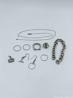 All ten sterling pieces laid out