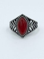 Front view of marquise carnelian ring with bead detailing
