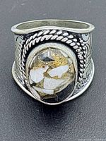 Front view showing jasper cabochon and band detailing