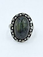 Front view showing stone and beaded border