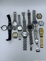 Group shot of all wristwatches laid out
