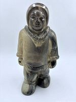 Front view of stone hunter figurine