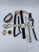 All twelve watches laid out for overview